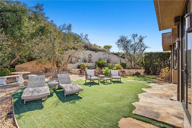 view of yard featuring a fenced backyard