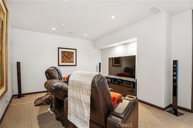 living room with recessed lighting, visible vents, light colored carpet, and baseboards