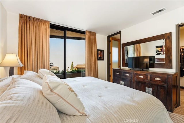 bedroom with visible vents