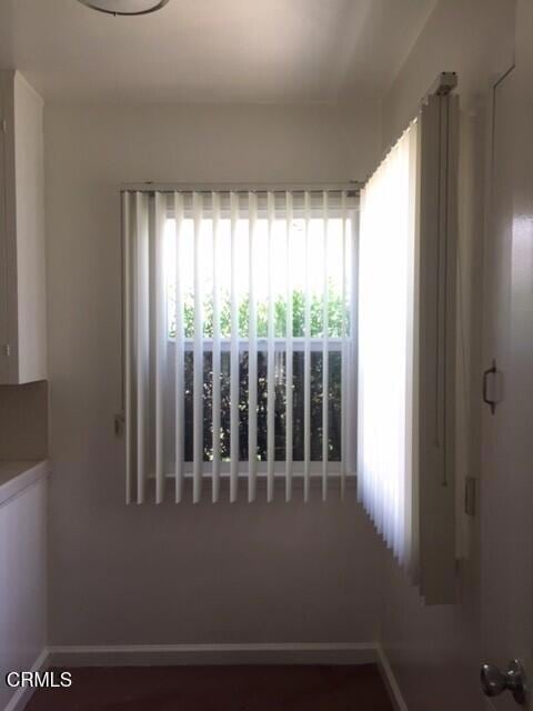 interior space with baseboards