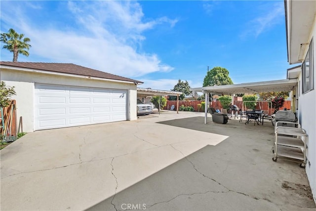 garage featuring fence