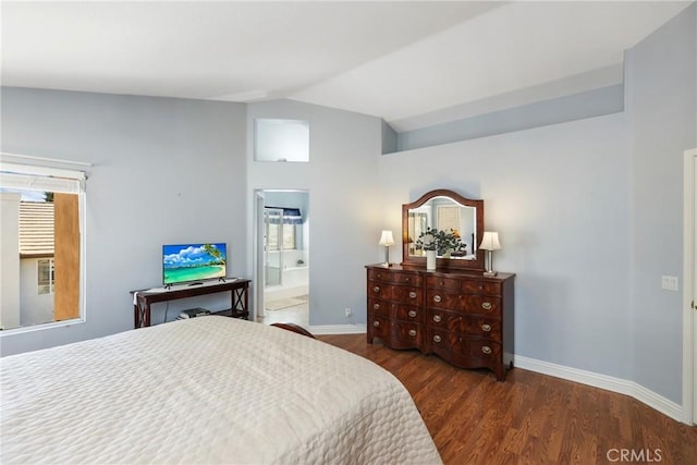 bedroom with vaulted ceiling, multiple windows, wood finished floors, and baseboards