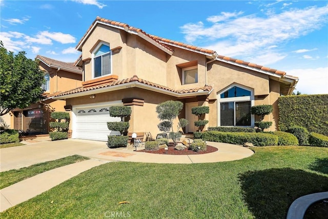 mediterranean / spanish-style house featuring a tile roof, stucco siding, concrete driveway, a front yard, and a garage