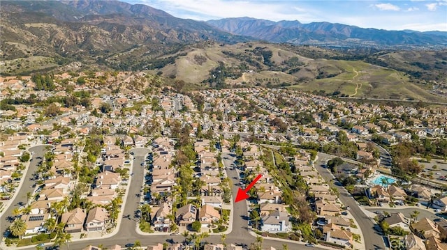 aerial view with a mountain view and a residential view