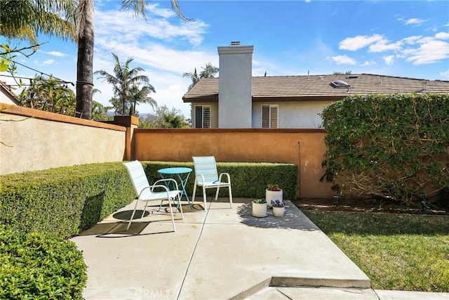 view of patio with fence