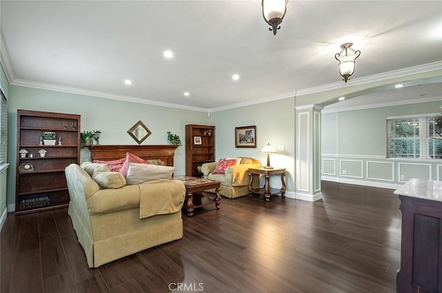 bedroom featuring crown molding, recessed lighting, dark wood finished floors, and decorative columns