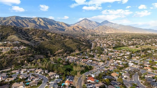 drone / aerial view with a residential view and a mountain view