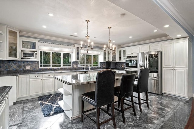 kitchen featuring open shelves, stainless steel appliances, crown molding, and a center island