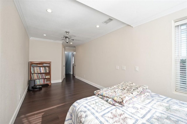 bedroom featuring dark wood-style flooring, crown molding, recessed lighting, visible vents, and baseboards