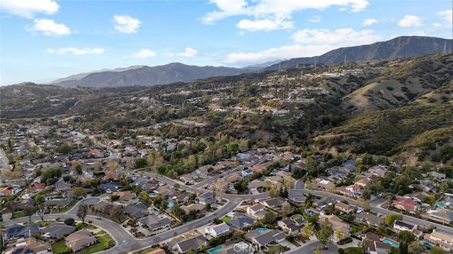 birds eye view of property featuring a residential view and a mountain view