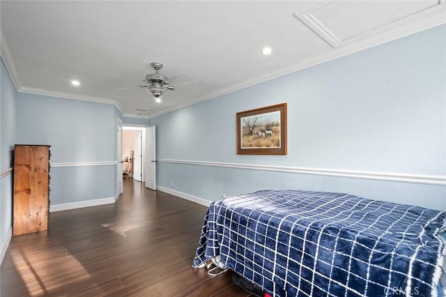 bedroom featuring attic access, ornamental molding, baseboards, and wood finished floors