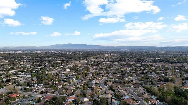 bird's eye view with a residential view and a mountain view