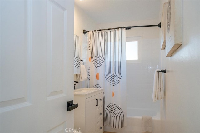 full bathroom featuring shower / tub combo and vanity