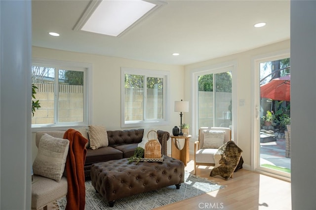 sunroom featuring a skylight