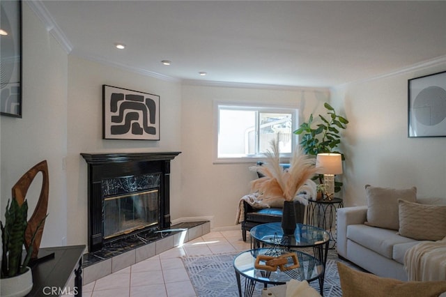 living area with baseboards, a fireplace, tile patterned flooring, and crown molding