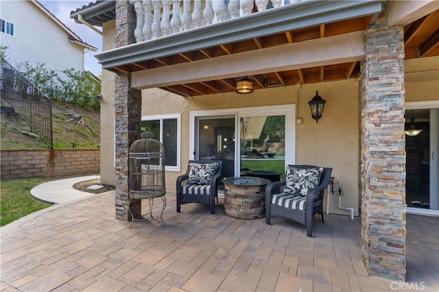 view of patio featuring fence