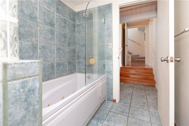 bathroom featuring a combined bath / shower with jetted tub and tile patterned floors