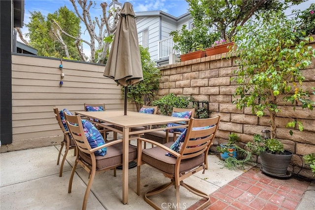 view of patio / terrace featuring a fenced backyard and outdoor dining area