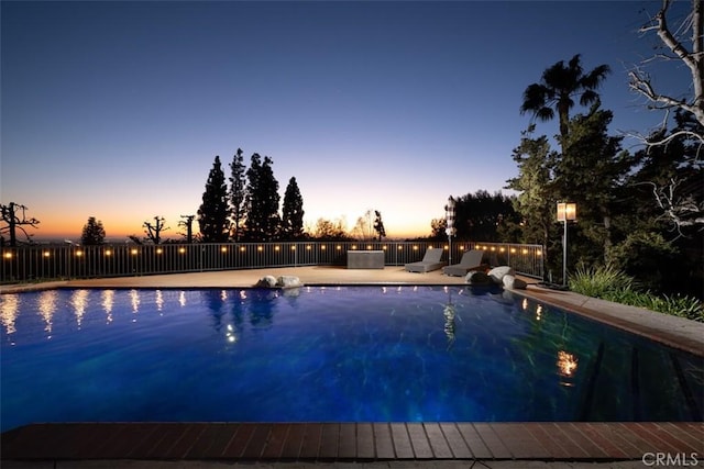 10831 Hideaway Dr, North Tustin, CA 92705 - pool at dusk with a fenced in pool