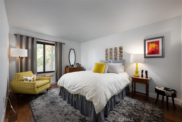 10831 Hideaway Dr, North Tustin, CA 92705 - bedroom with baseboards and dark wood finished floors