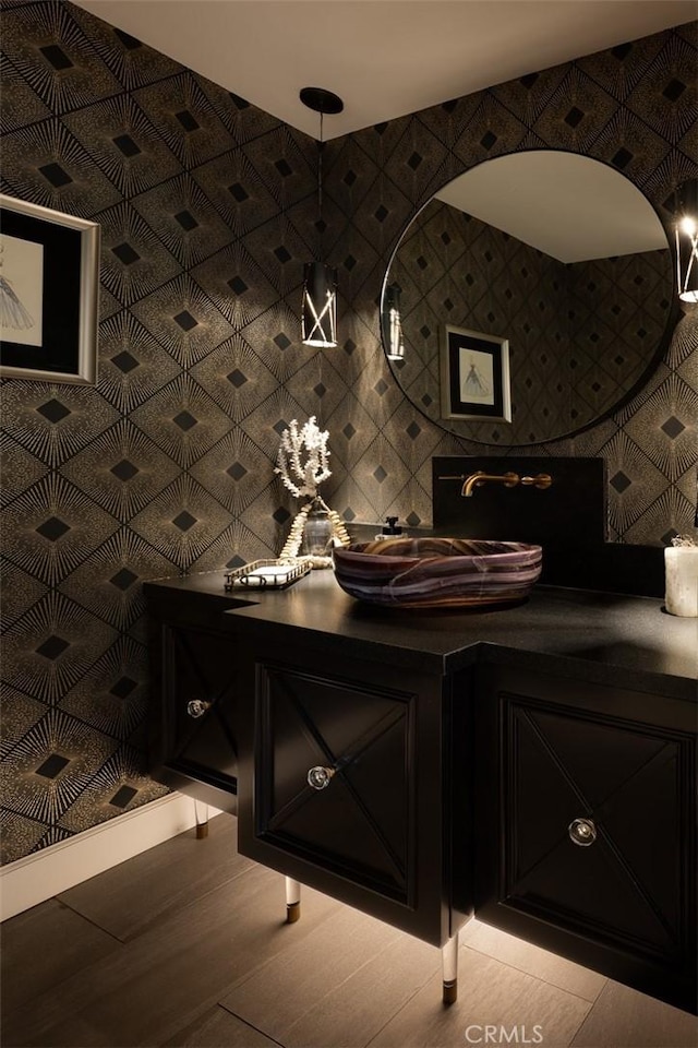 10831 Hideaway Dr, North Tustin, CA 92705 - bathroom featuring wood finished floors and vanity