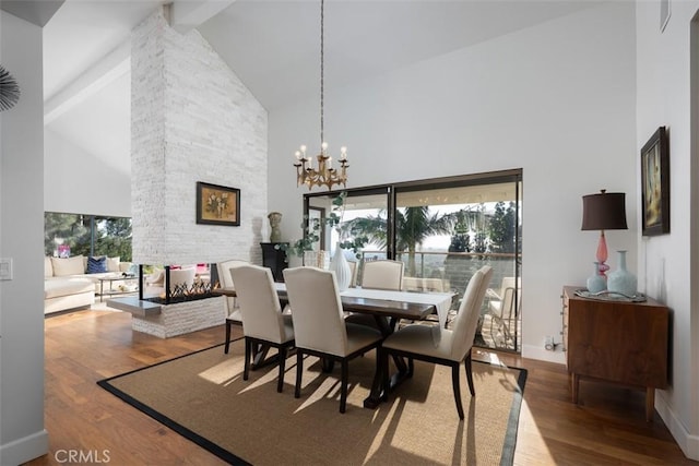 10831 Hideaway Dr, North Tustin, CA 92705 - dining area with high vaulted ceiling, beam ceiling, and wood finished floors