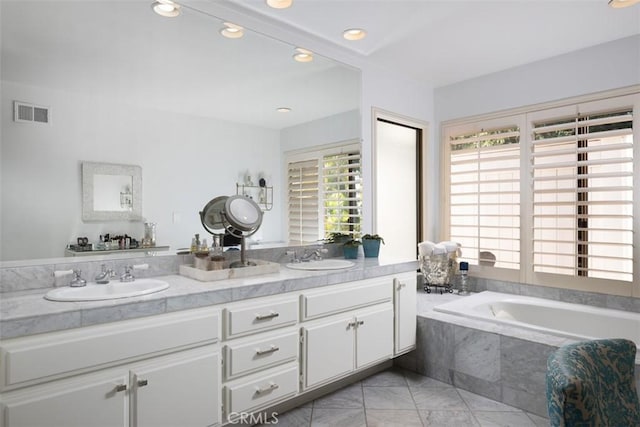 10831 Hideaway Dr, North Tustin, CA 92705 - full bathroom with a sink, a garden tub, double vanity, and visible vents