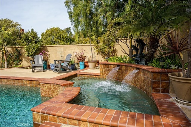23 Landing, Laguna Niguel, CA 92677 - view of pool with an in-ground hot tub, a fenced backyard, and a patio area