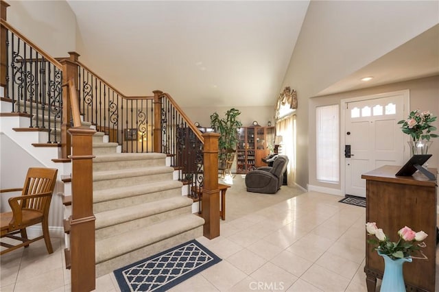23 Landing, Laguna Niguel, CA 92677 - foyer entrance with light tile patterned flooring, stairway, recessed lighting, and high vaulted ceiling