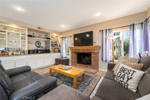 23 Landing, Laguna Niguel, CA 92677 - living area featuring a fireplace, light tile patterned flooring, and recessed lighting