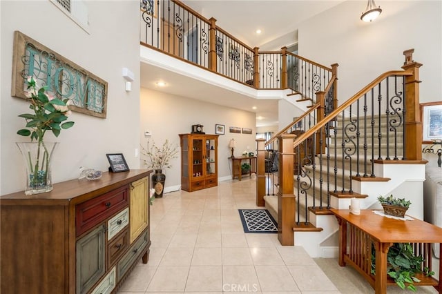 23 Landing, Laguna Niguel, CA 92677 - entryway with a towering ceiling, stairway, light tile patterned floors, and recessed lighting