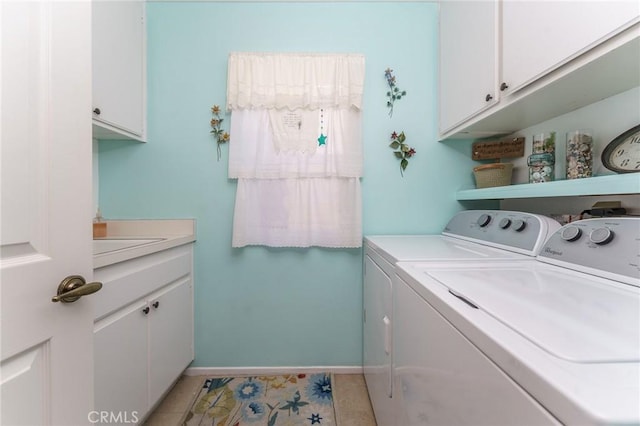 23 Landing, Laguna Niguel, CA 92677 - laundry area with washer and dryer, cabinet space, and light tile patterned floors