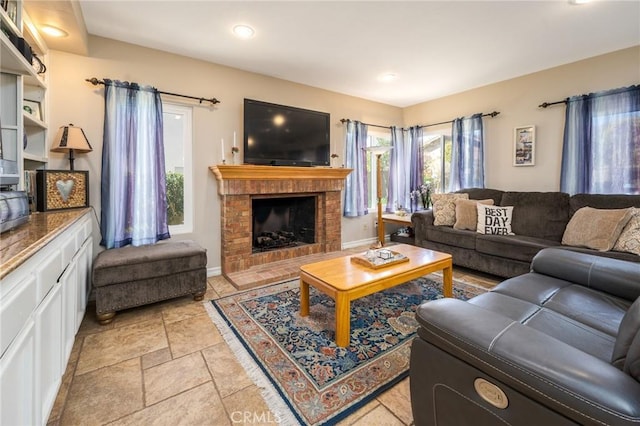 23 Landing, Laguna Niguel, CA 92677 - living room with a brick fireplace and recessed lighting