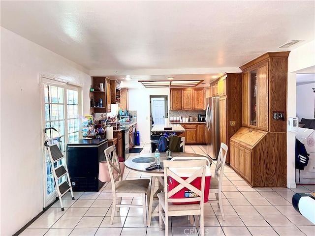 dining room featuring light tile patterned floors