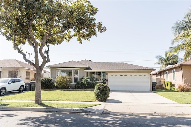 ranch-style house featuring a garage, driveway, a front lawn, and stucco siding