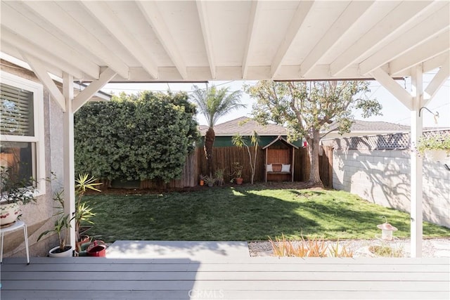 view of yard with a fenced backyard