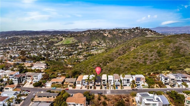 drone / aerial view with a residential view and a mountain view