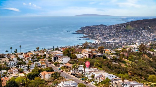 aerial view featuring a residential view and a water view