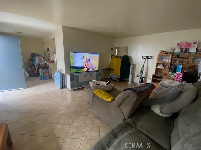 living area with light tile patterned flooring