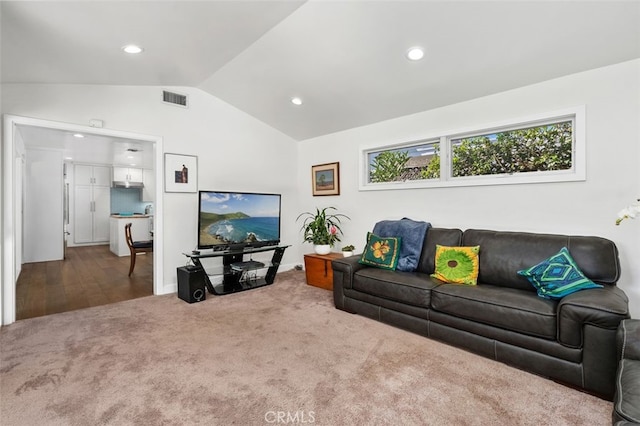 living room with lofted ceiling, carpet, visible vents, and recessed lighting