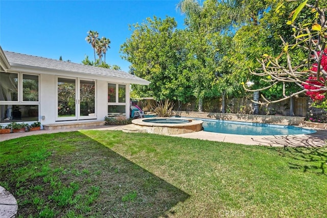 view of swimming pool with a fenced backyard, a fenced in pool, a lawn, and an in ground hot tub