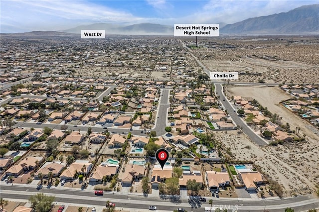 aerial view with a mountain view and a residential view