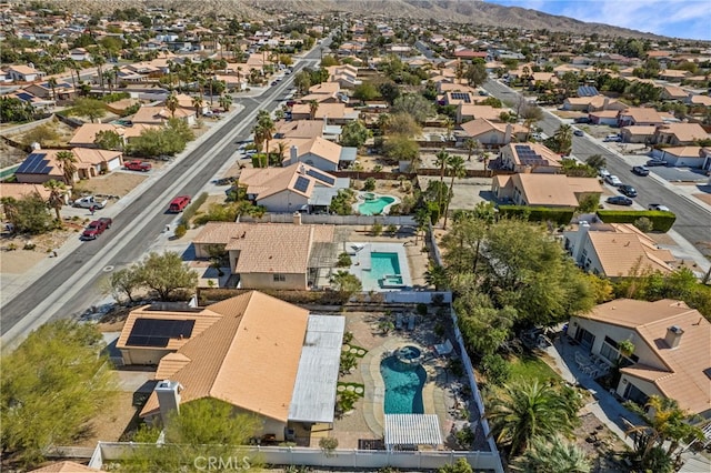 drone / aerial view with a mountain view and a residential view