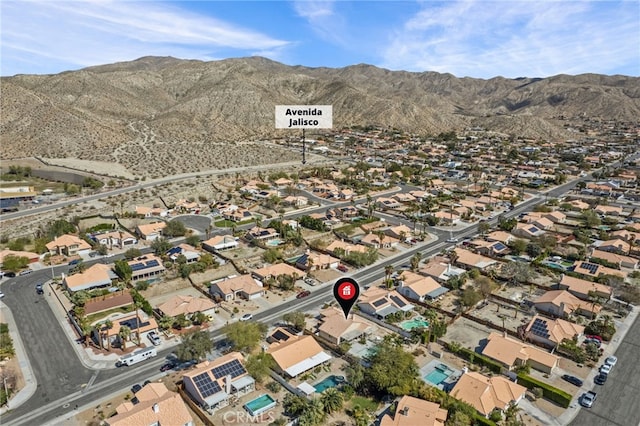 aerial view with a mountain view and a residential view