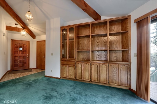 entrance foyer featuring beamed ceiling, carpet flooring, and baseboards