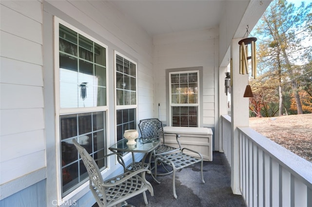 balcony featuring a porch