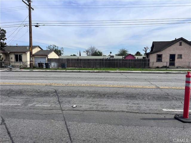 view of street featuring sidewalks and curbs