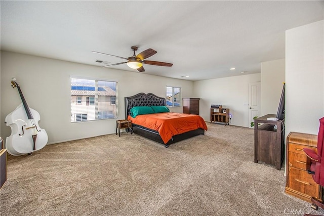 bedroom with recessed lighting, visible vents, carpet, and a ceiling fan