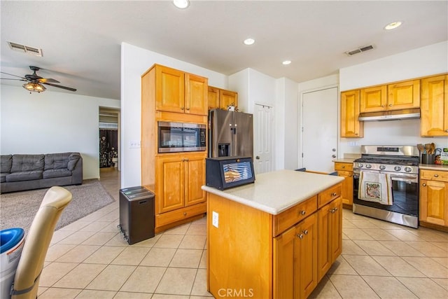 kitchen with visible vents, appliances with stainless steel finishes, and light tile patterned flooring