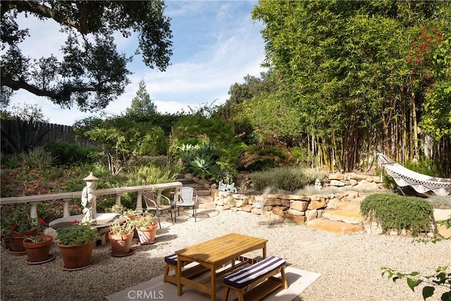 exterior space featuring fence and a patio